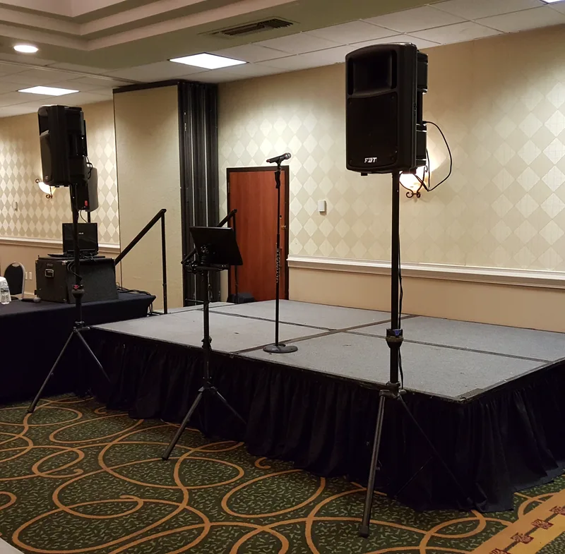 Karaoke stage setup DJ Don provides for venue bookings: speakers, microphones and lyric display